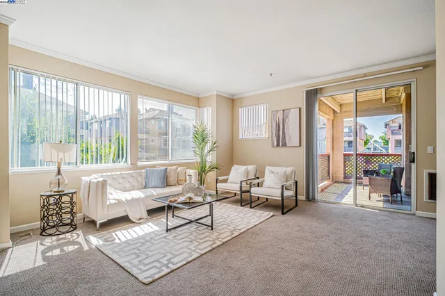a bedroom with a bed and a potted plant