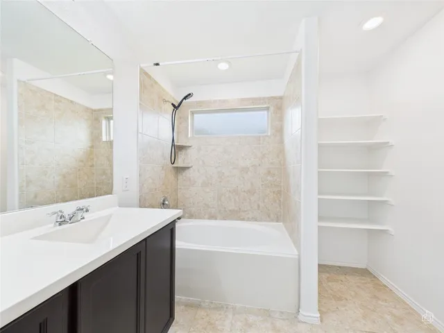 a view of a room that has a window in it