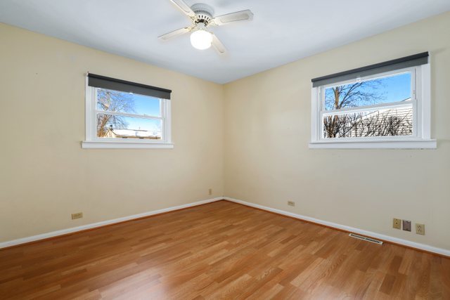 307 Oakwood Road Vernon Hills, IL 60061 - Photo 20 of 28 a view of a room with wooden floor and window