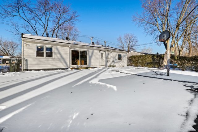 307 Oakwood Road Vernon Hills, IL 60061 - Photo 25 of 28 a view of a house with a large tree