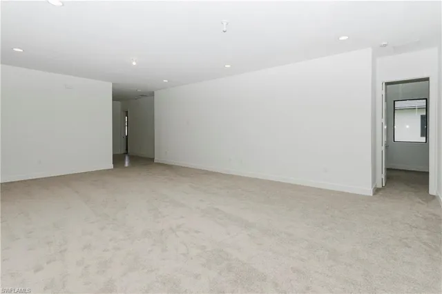 an empty room with a bathroom