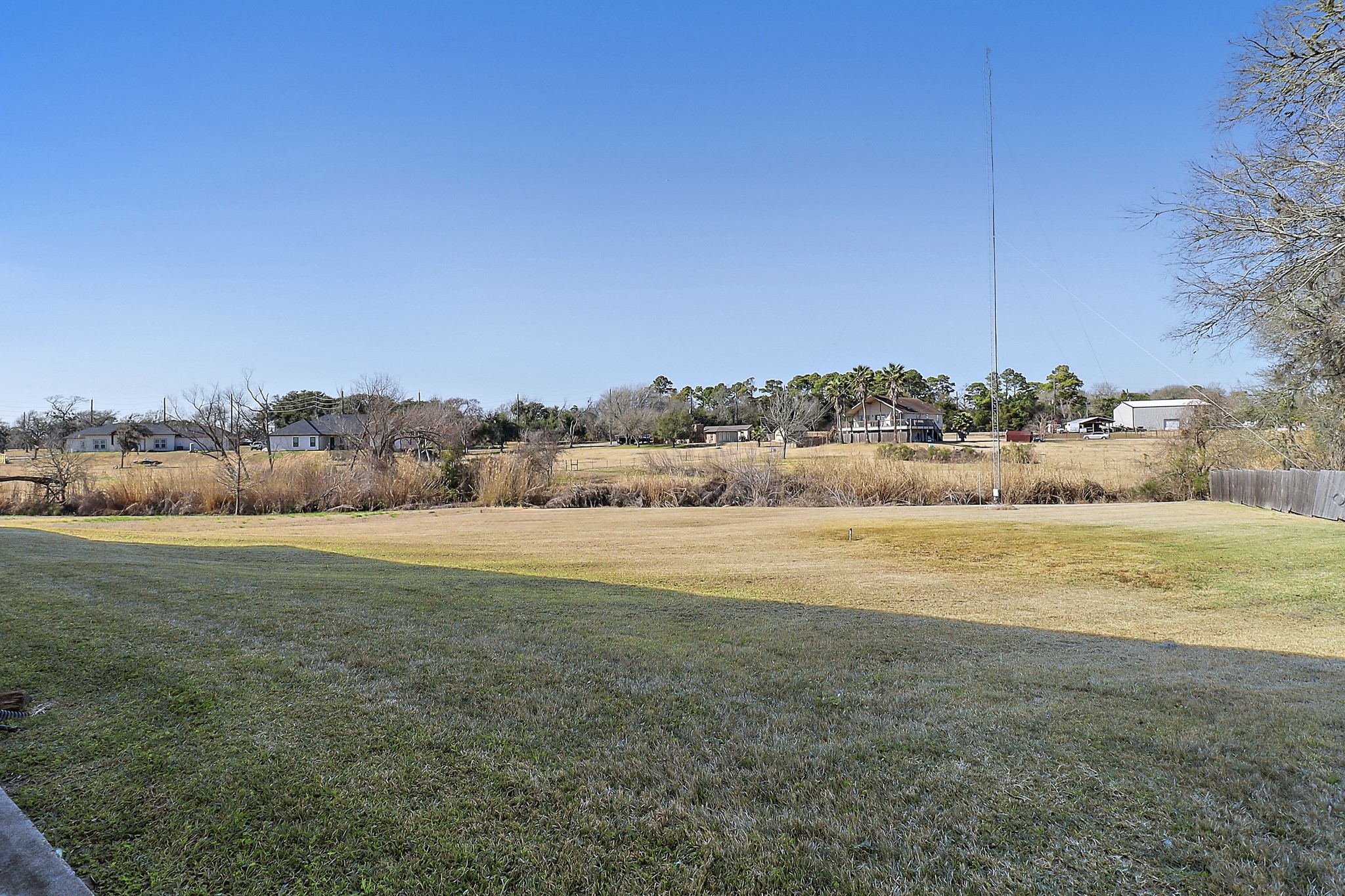 1306 Spring Branch Drive Baytown, TX 77523 - Photo 8 of 38 a view of an outdoor space and mountain view