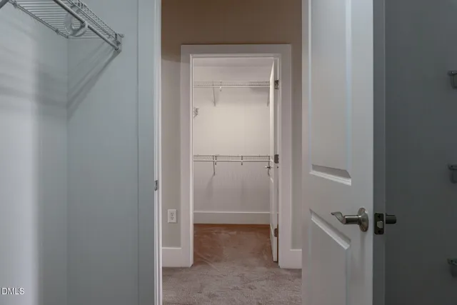 a view of a room with racks on the wall