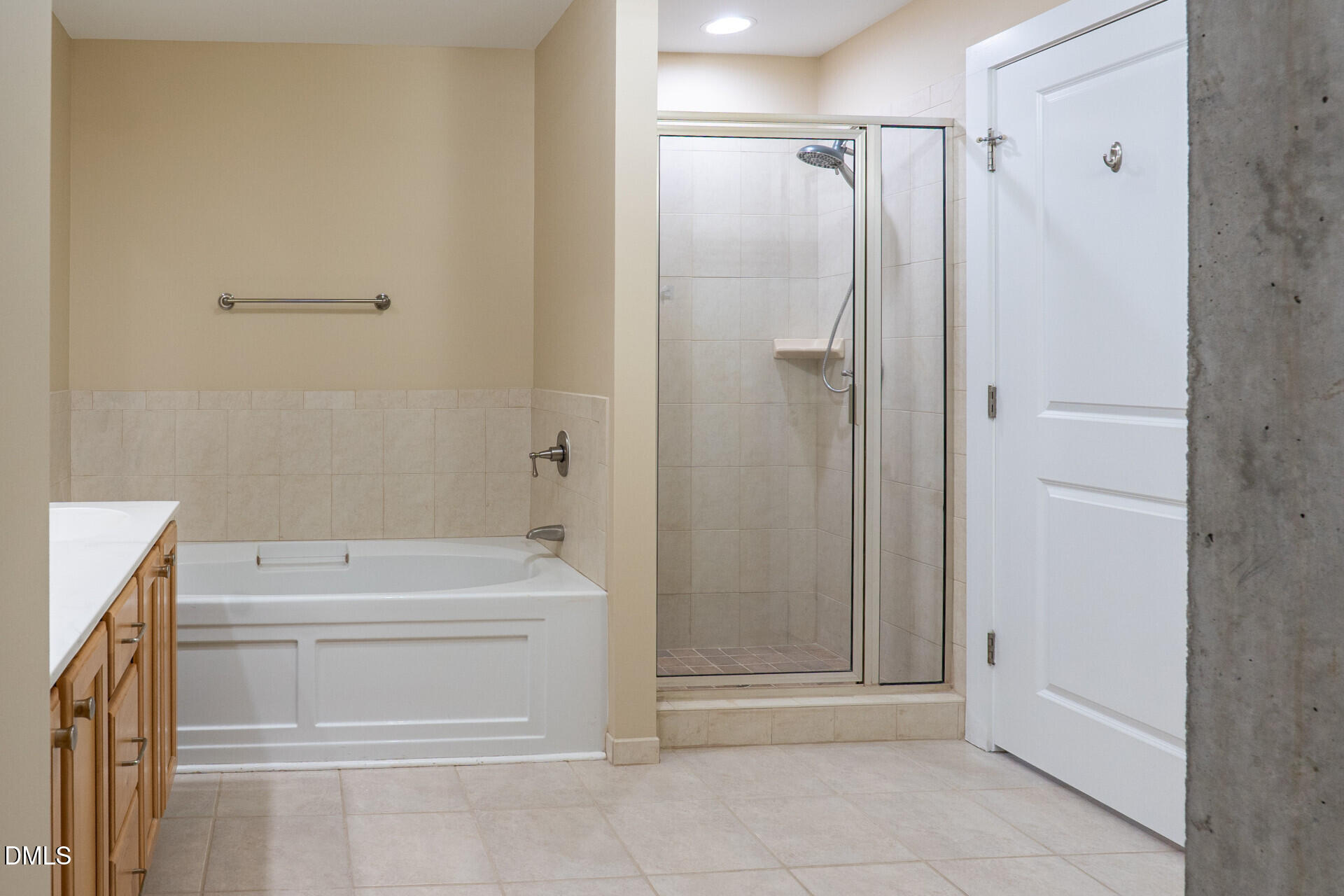 444 South Blount Street, Unit 328 Raleigh, NC 27601 - Photo 28 of 51 a bathroom with a shower a toilet and a sink