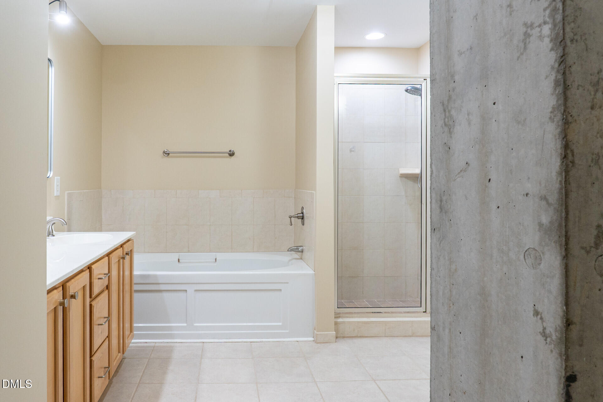 444 South Blount Street, Unit 328 Raleigh, NC 27601 - Photo 30 of 51 a bathroom with a sink a toilet and shower
