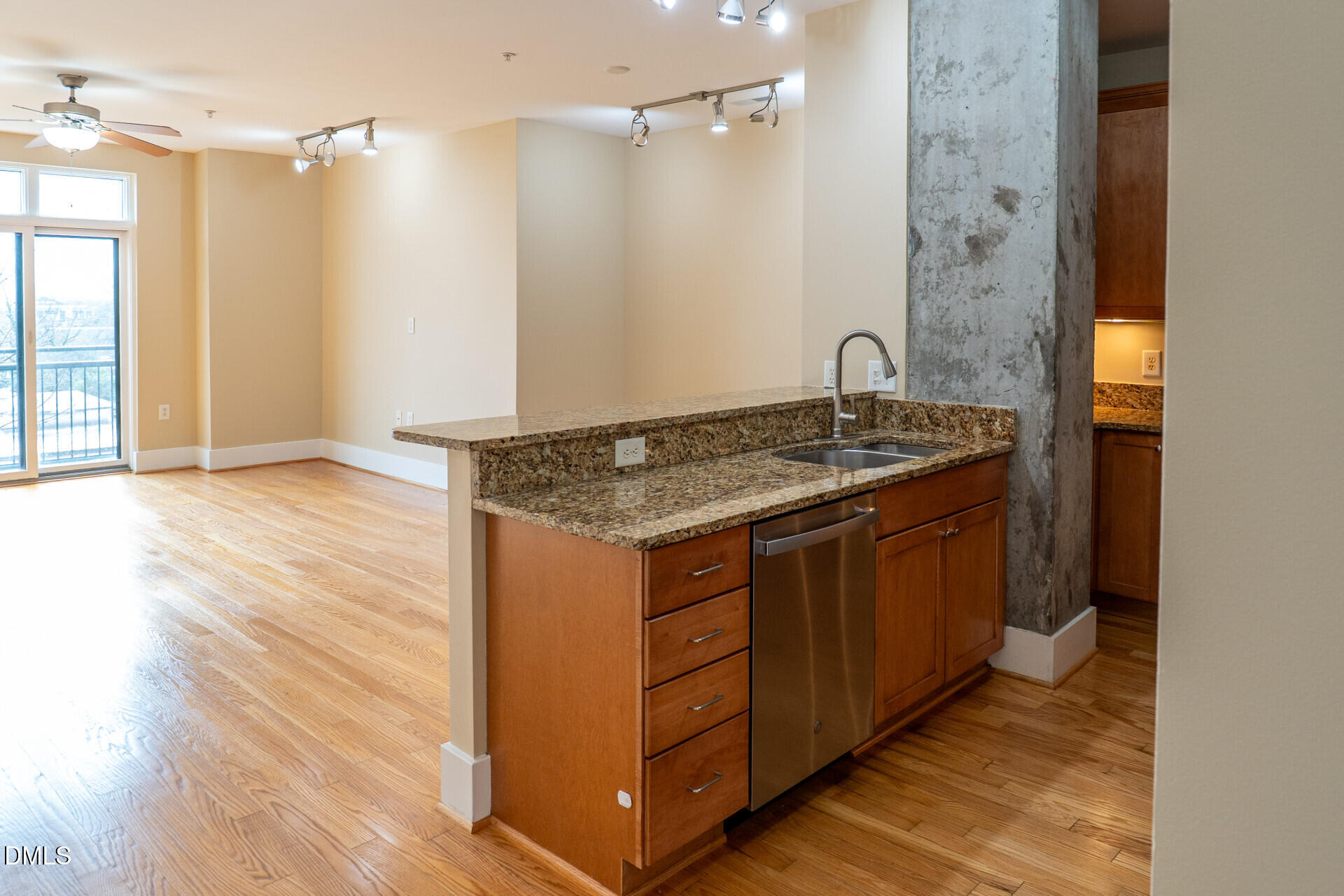 444 South Blount Street, Unit 328 Raleigh, NC 27601 - Photo 7 of 51 a bathroom with a granite countertop sink a mirror and shower