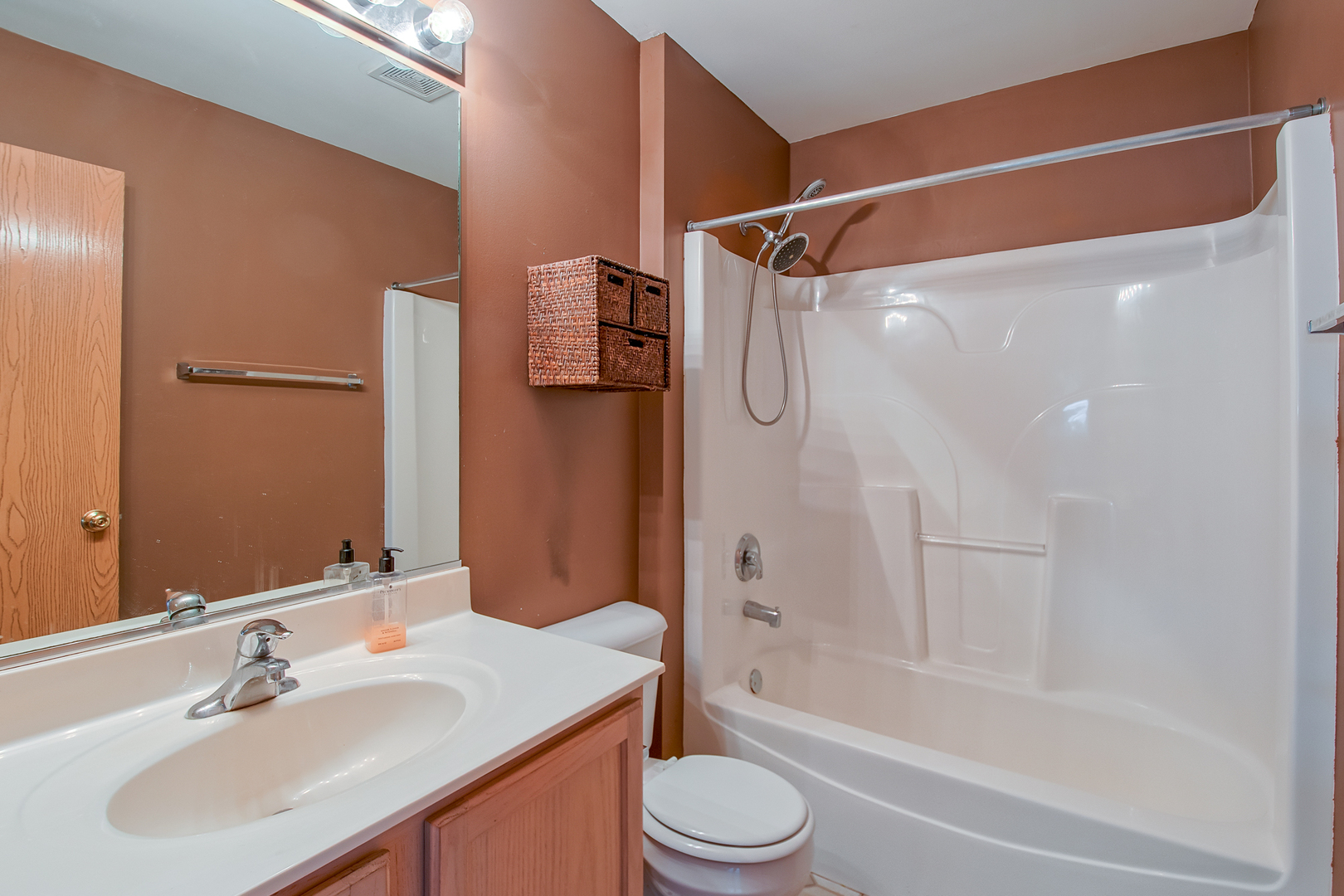 545 North Fox Trail Round Lake, IL 60073 - Photo 10 of 15 a bathroom with a sink toilet and shower
