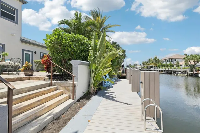 a view of a chairs and table on the wooden floor