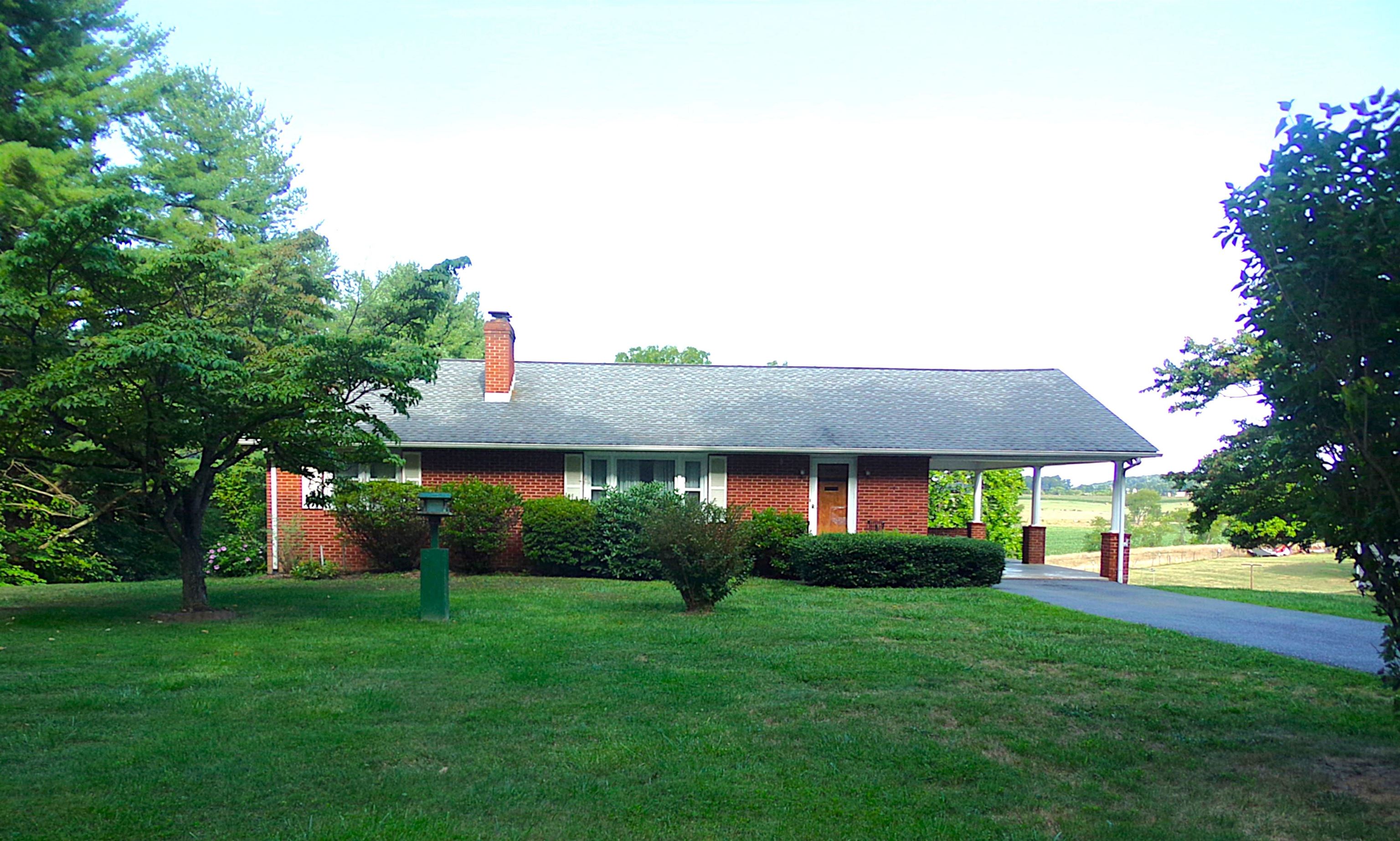 1728 Rockfish Road Waynesboro, VA 22980 - Photo 1 of 42 a front view of house with yard and green space