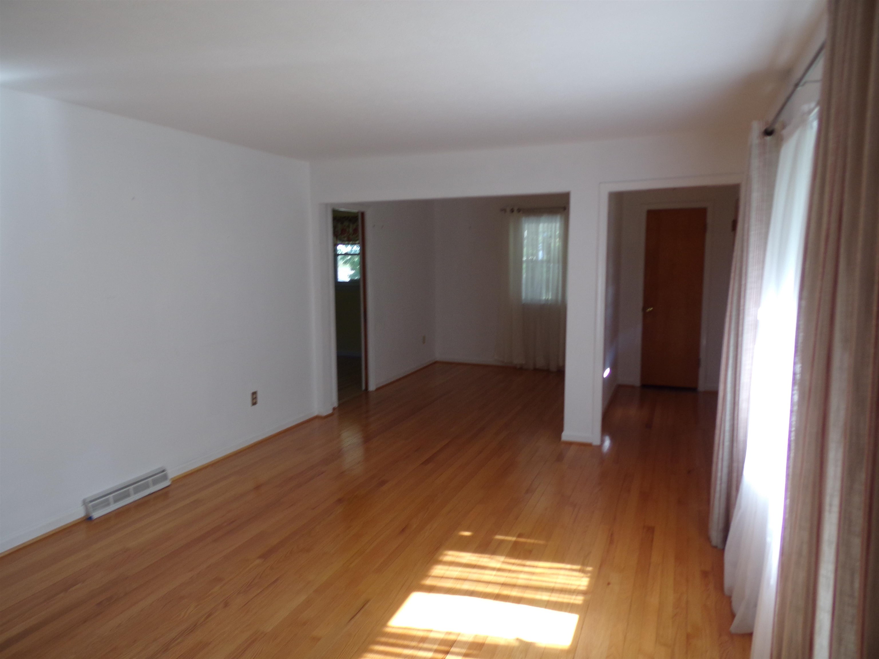 1728 Rockfish Road Waynesboro, VA 22980 - Photo 16 of 42 a view of empty room with wooden floor
