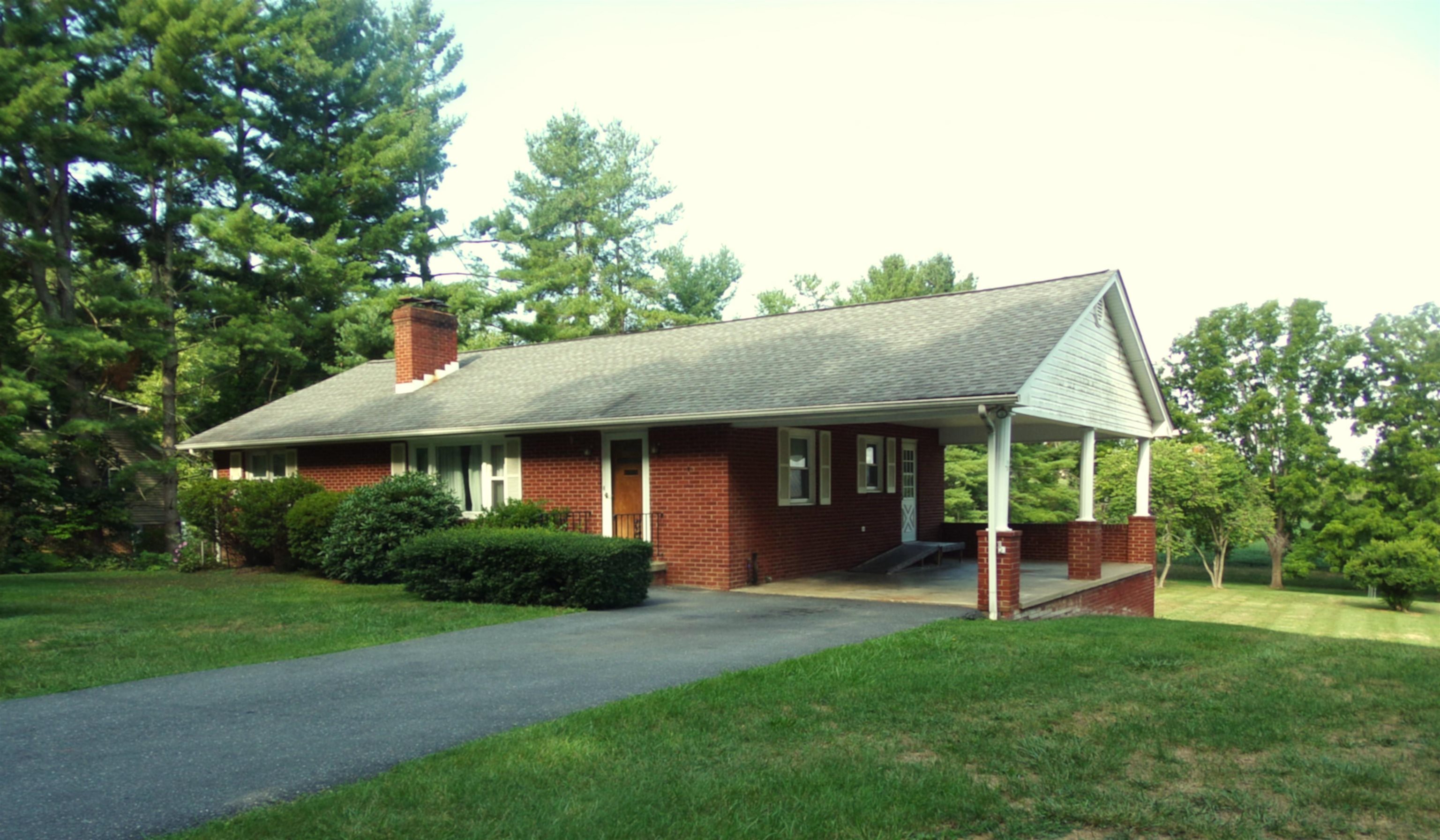 1728 Rockfish Road Waynesboro, VA 22980 - Photo 2 of 42 a front view of a house with a garden