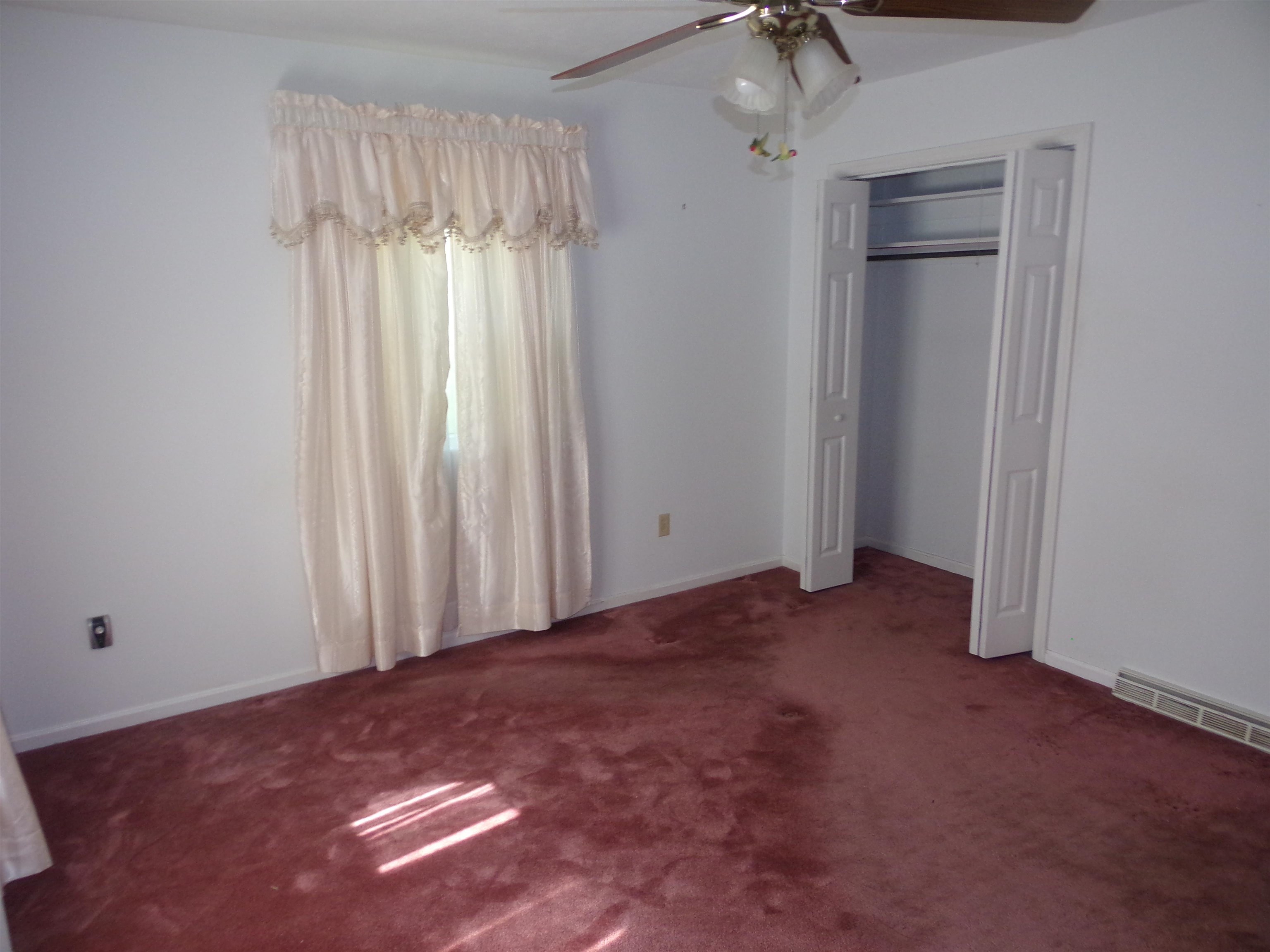 1728 Rockfish Road Waynesboro, VA 22980 - Photo 27 of 42 an empty room with windows and closet