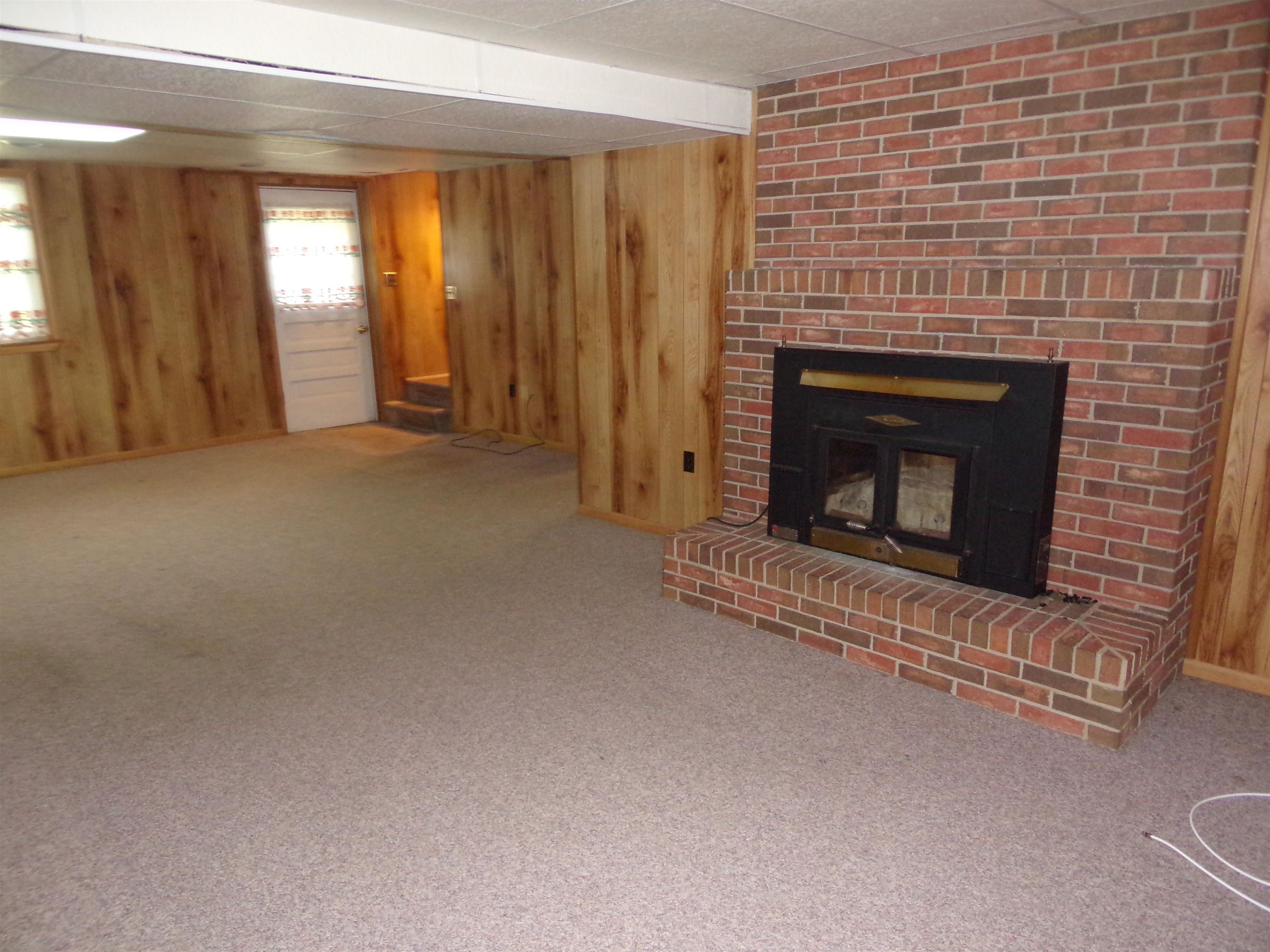 1728 Rockfish Road Waynesboro, VA 22980 - Photo 30 of 42 a view of empty room with fireplace and window
