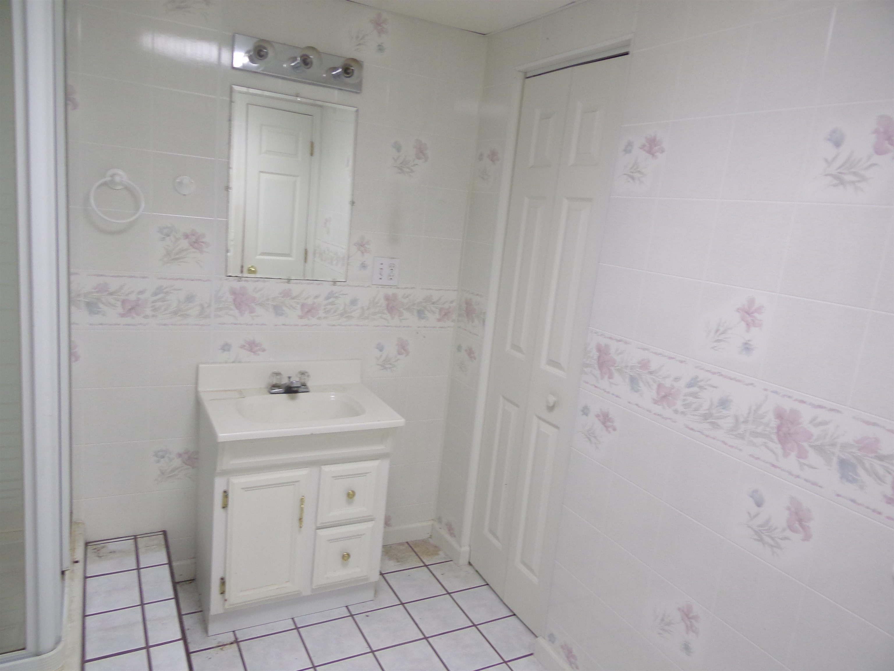 1728 Rockfish Road Waynesboro, VA 22980 - Photo 34 of 42 a bathroom with a sink toilet and vanity