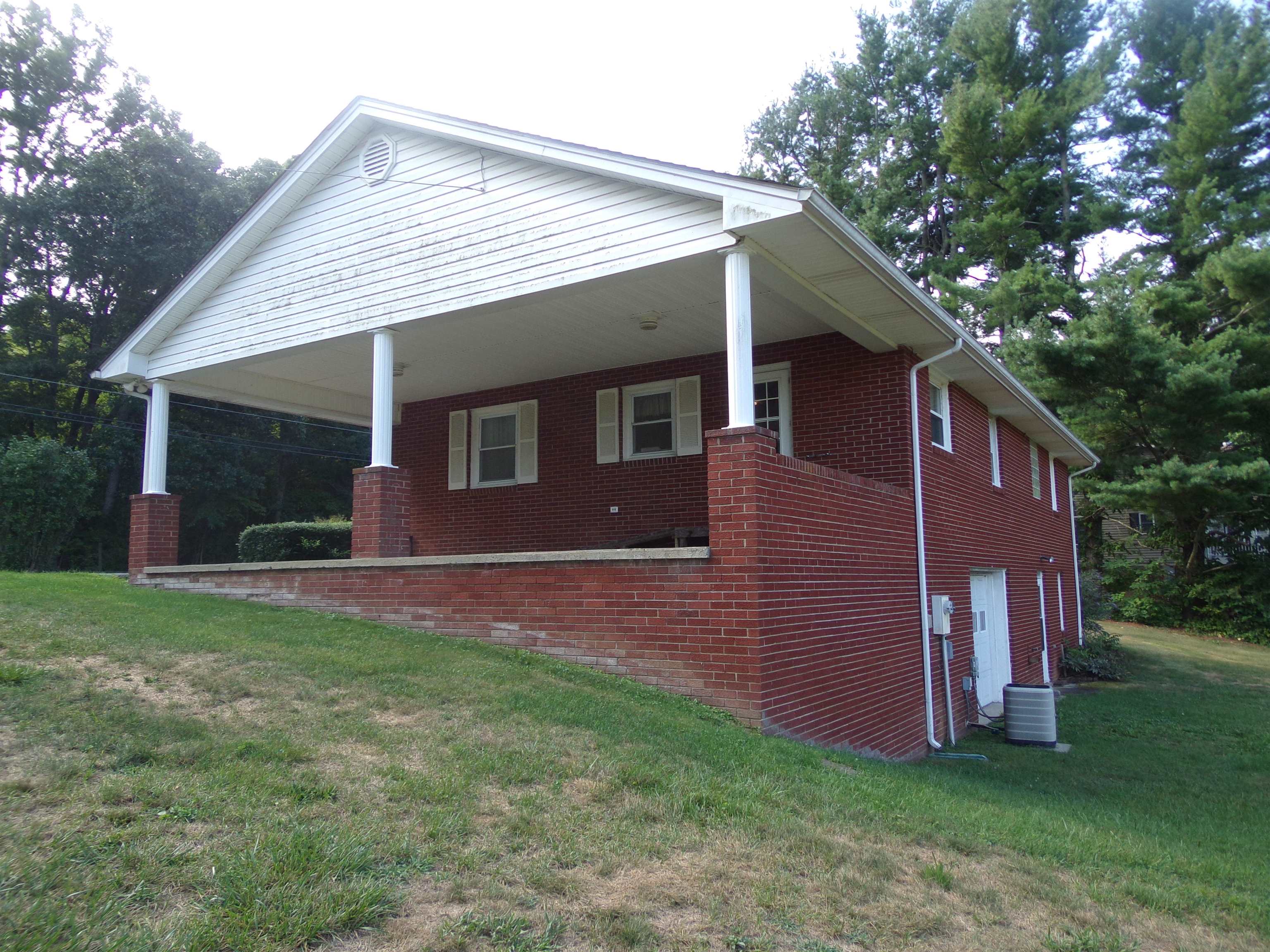 1728 Rockfish Road Waynesboro, VA 22980 - Photo 6 of 42 a front view of a house with garden