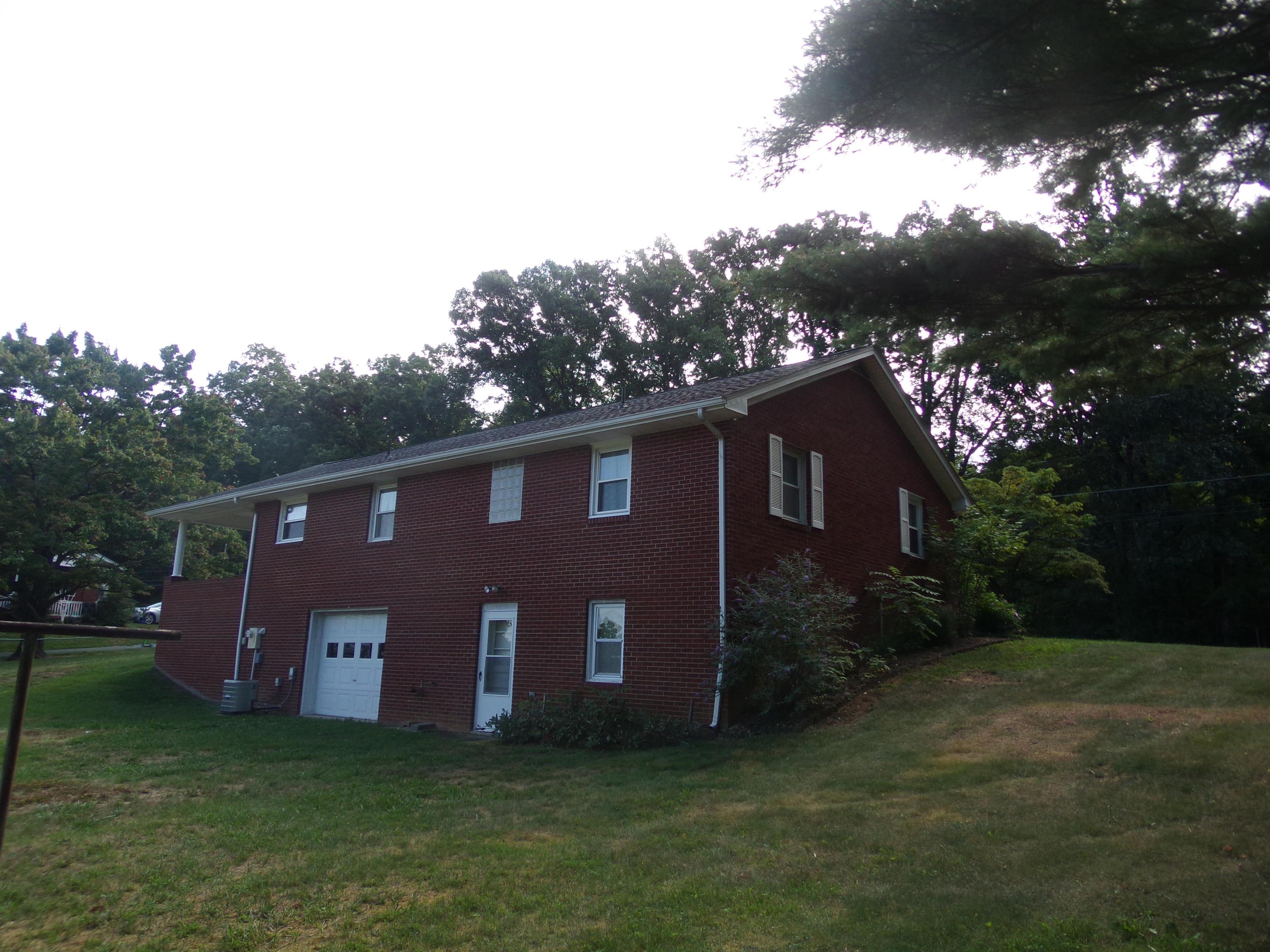1728 Rockfish Road Waynesboro, VA 22980 - Photo 7 of 42 a front view of house with yard and green space