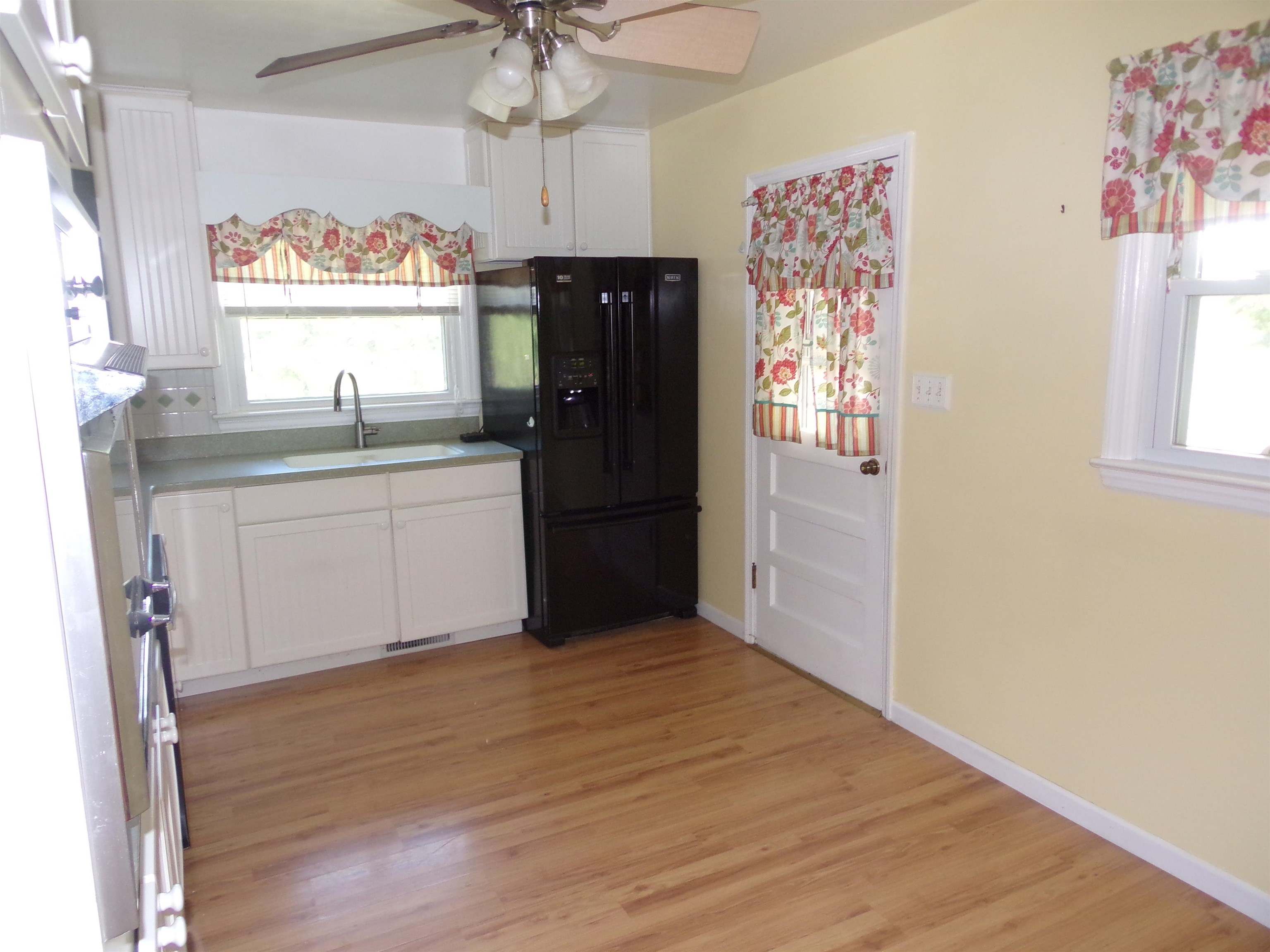1728 Rockfish Road Waynesboro, VA 22980 - Photo 10 of 42 a kitchen with stainless steel appliances granite countertop a refrigerator and a sink