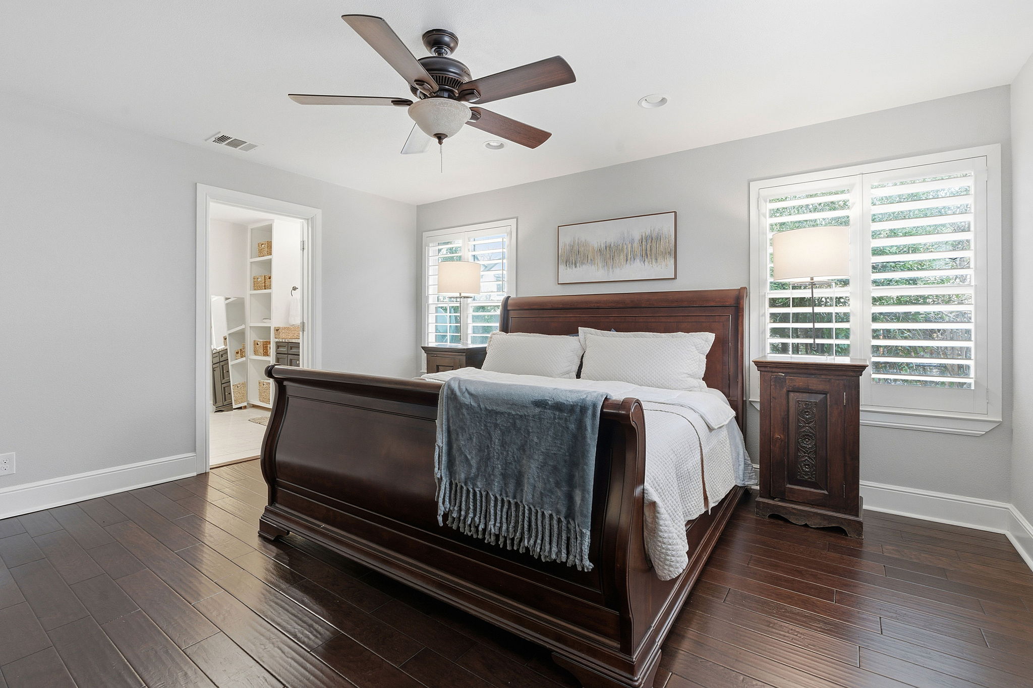 6809 Pioneer Place Austin, TX 78757 - Photo 19 of 33 a large bed sitting in a bedroom next to a window