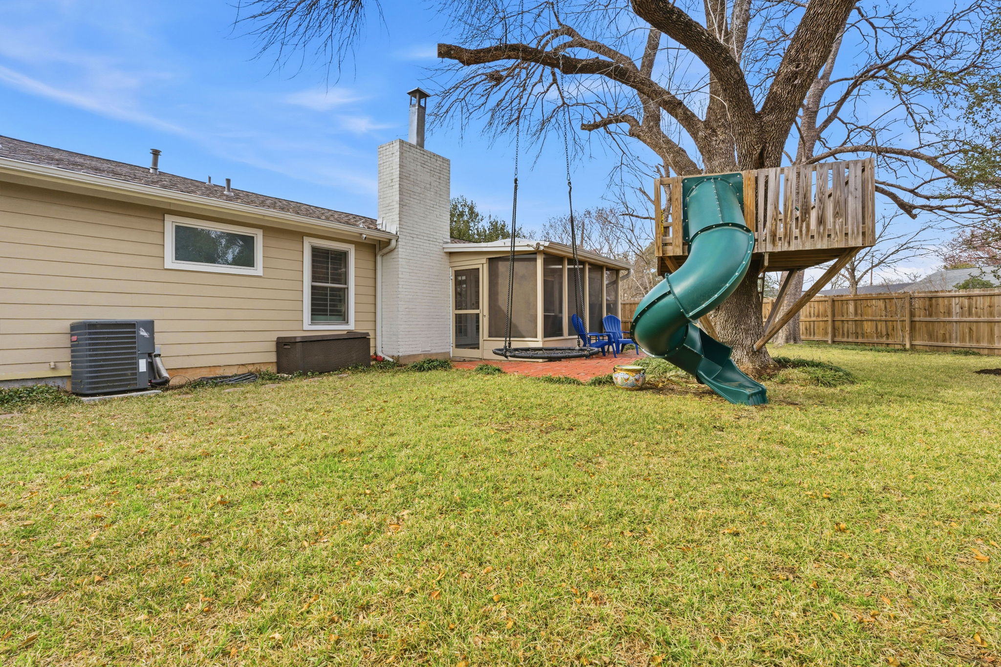 6809 Pioneer Place Austin, TX 78757 - Photo 31 of 33 a view of a house with basketball court