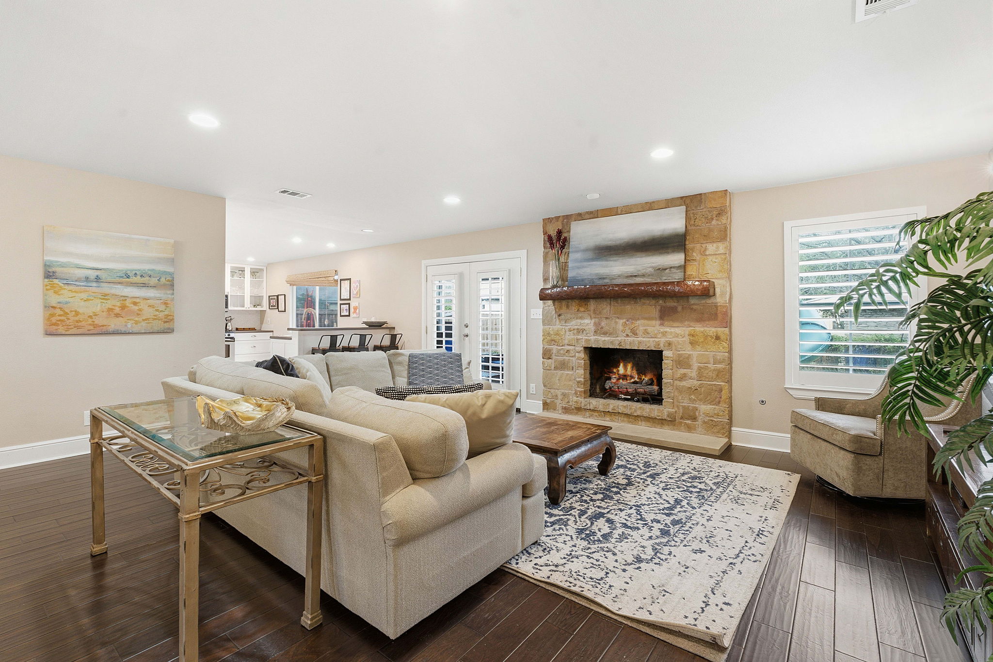 6809 Pioneer Place Austin, TX 78757 - Photo 7 of 33 a living room with furniture and a fireplace