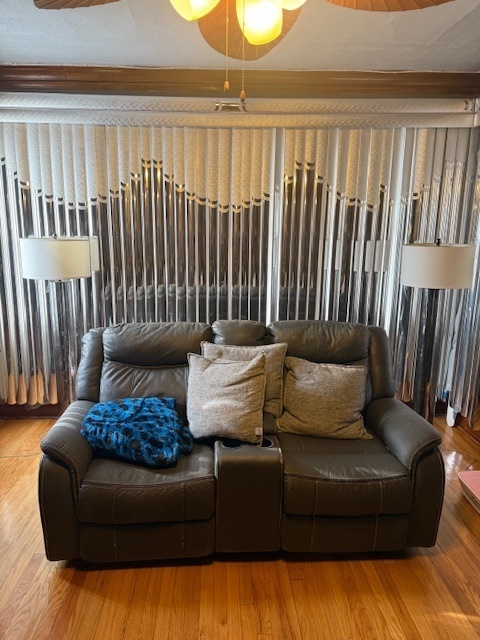 907 South 10th Avenue Maywood, IL 60153 - Photo 4 of 12 a living room with furniture and a window