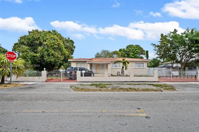 a view of house with outdoor space and street view