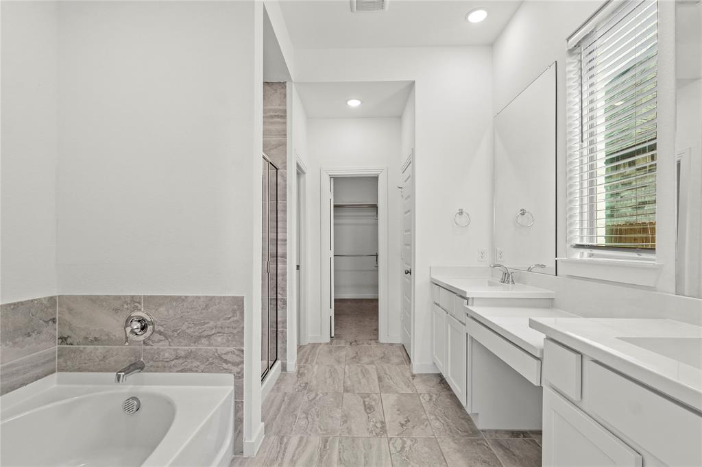 1805 Lockhart Drive Forney, TX 75126 - Photo 6 of 22 Full bath featuring a shower stall, vanity, a garden tub, a walk in closet, and recessed lighting
