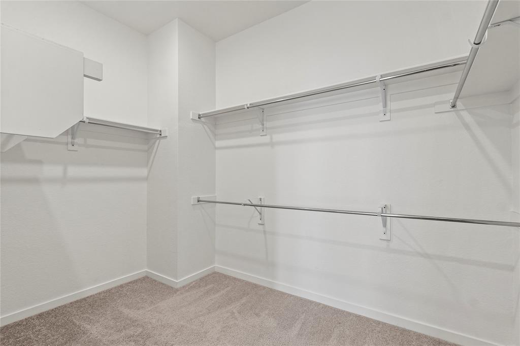 1805 Lockhart Drive Forney, TX 75126 - Photo 8 of 22 Walk in closet with light carpet