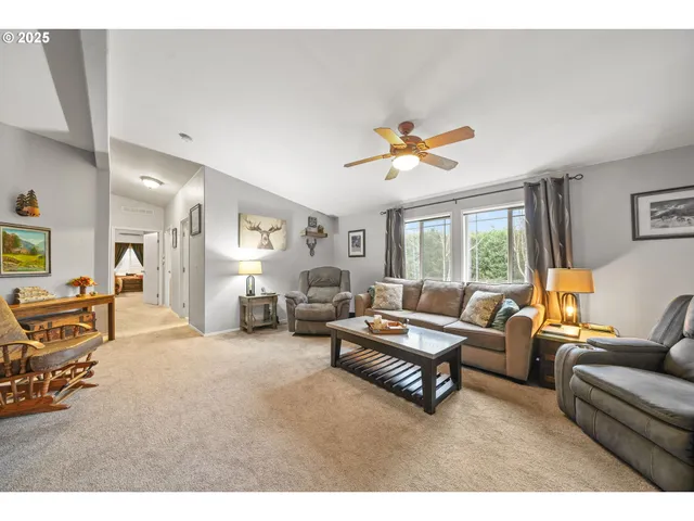 a living room with furniture and a couch