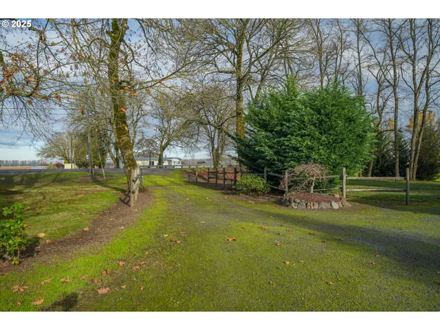 a view of a lake with a yard