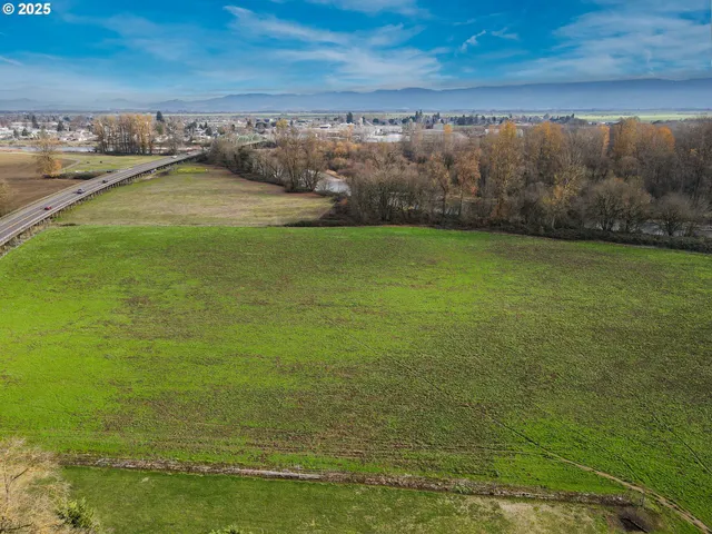 a view of a golf course with a lake