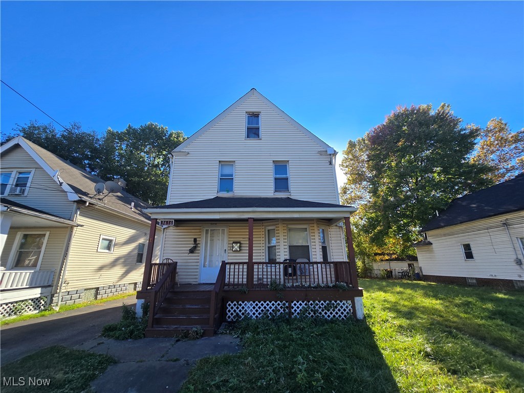 3616 Independence Road Cleveland, OH 44105 - Photo 1 of 10 View of front of property featuring a porch and a front lawn