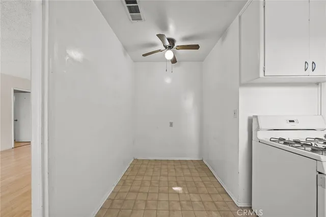 a view of a kitchen with a sink