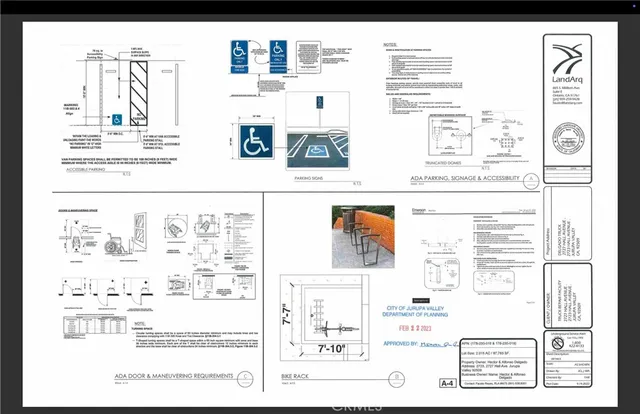 a black and white photo of a open kitchen