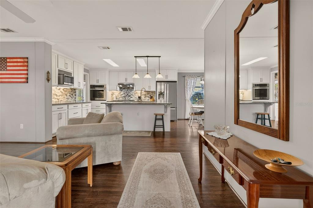 6249 South Esmeralda Terrace Lecanto, FL 34461 - Photo 13 of 61 a living room with stainless steel appliances kitchen island granite countertop furniture and a view of kitchen