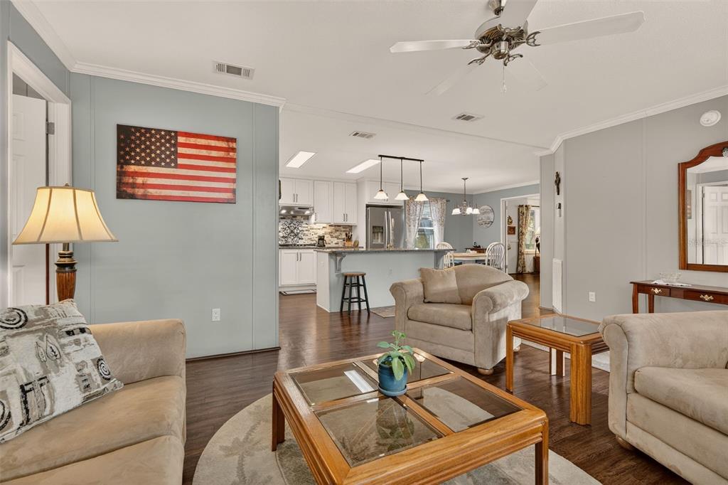 6249 South Esmeralda Terrace Lecanto, FL 34461 - Photo 15 of 61 a living room with furniture and a lamp