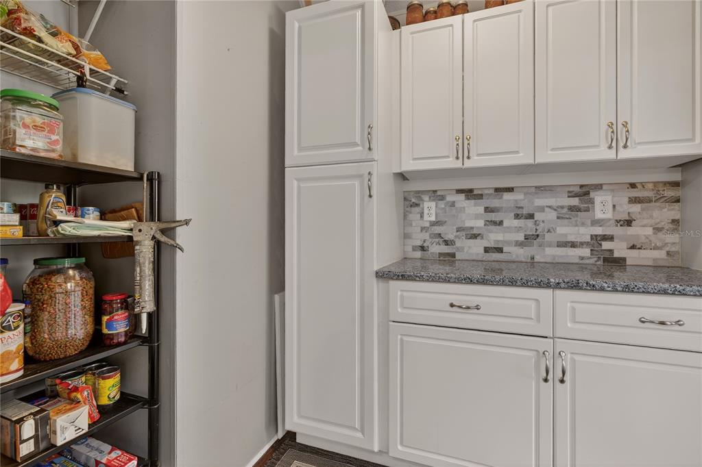 6249 South Esmeralda Terrace Lecanto, FL 34461 - Photo 20 of 61 a stove top oven sitting inside of a kitchen