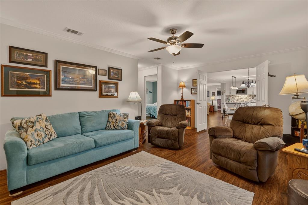 6249 South Esmeralda Terrace Lecanto, FL 34461 - Photo 24 of 61 a living room with furniture and a view of kitchen