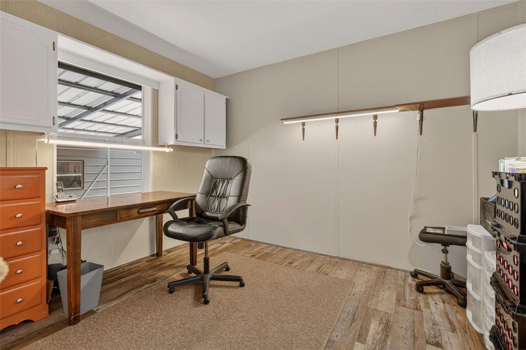 6249 South Esmeralda Terrace Lecanto, FL 34461 - Photo 26 of 61 a view of a workspace with furniture and a window