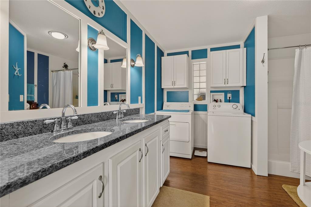 6249 South Esmeralda Terrace Lecanto, FL 34461 - Photo 35 of 61 a kitchen with sink cabinets and wooden floor