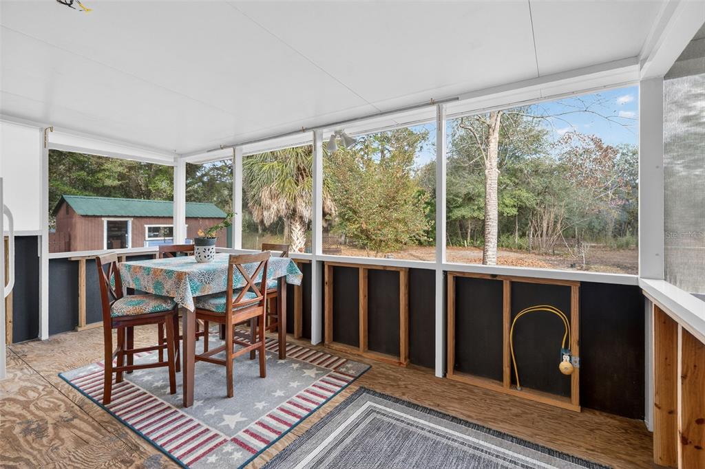 6249 South Esmeralda Terrace Lecanto, FL 34461 - Photo 37 of 61 a dining room with furniture window and outside view