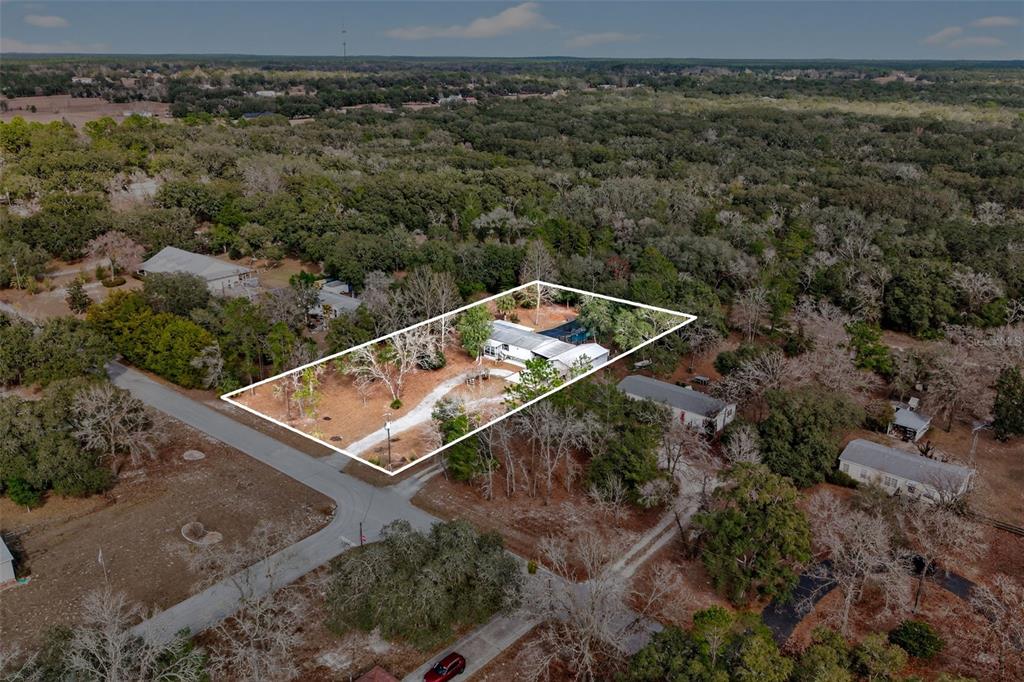 6249 South Esmeralda Terrace Lecanto, FL 34461 - Photo 56 of 61 an aerial view of house with yard