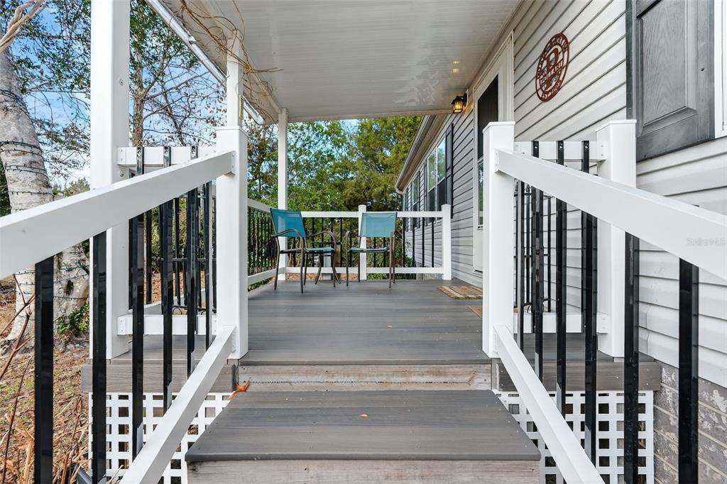 6249 South Esmeralda Terrace Lecanto, FL 34461 - Photo 10 of 61 a view of staircase with wooden floor and fence