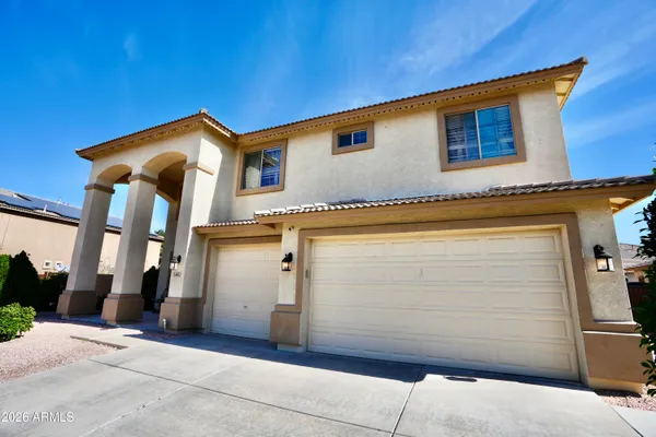a view of a house with a garage