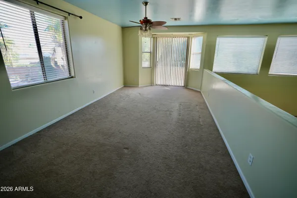 a view of hallway with windows