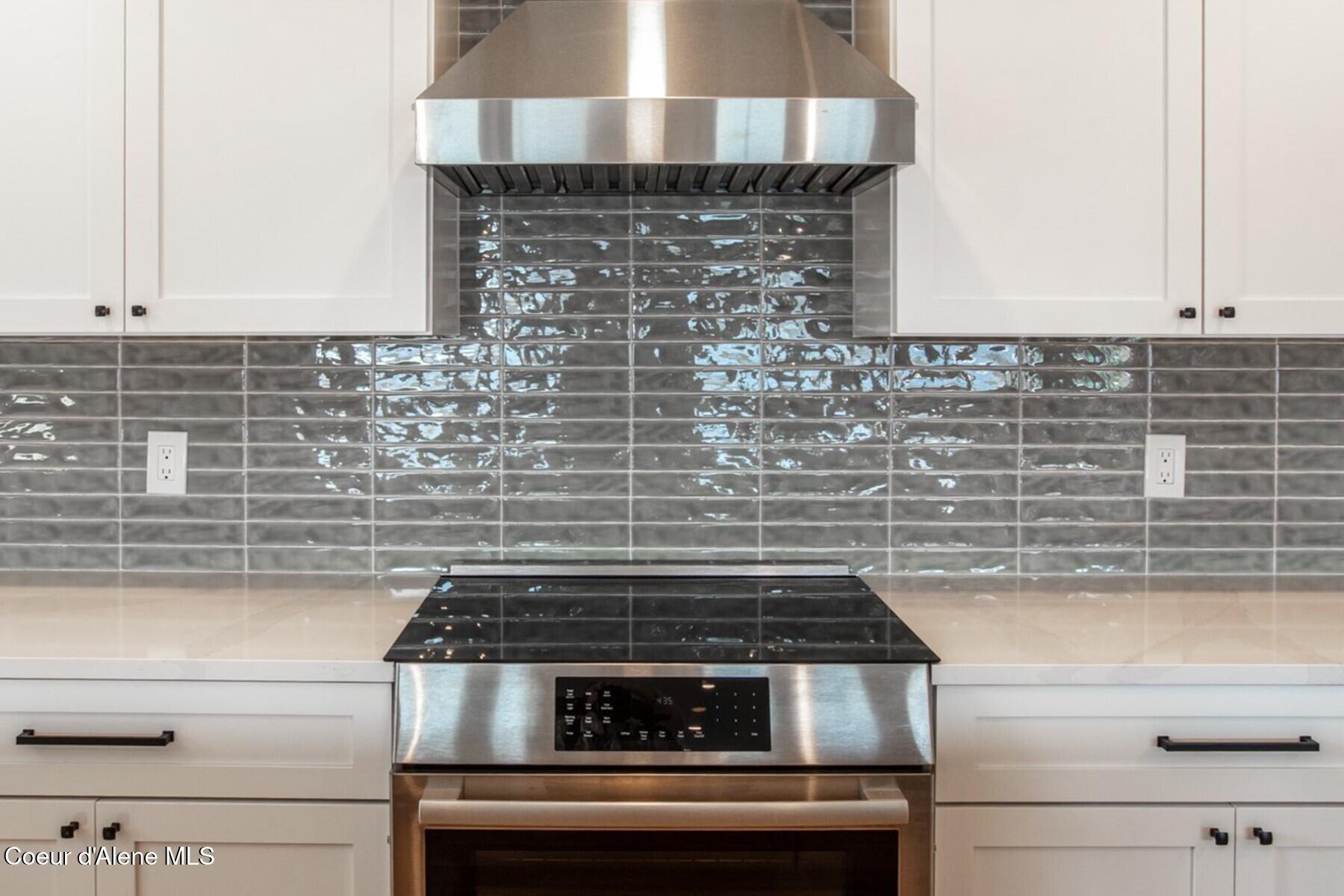 475 Campbell Point Road Laclede, ID 83841 - Photo 14 of 66 Tasteful Tile, Quartz Countertop