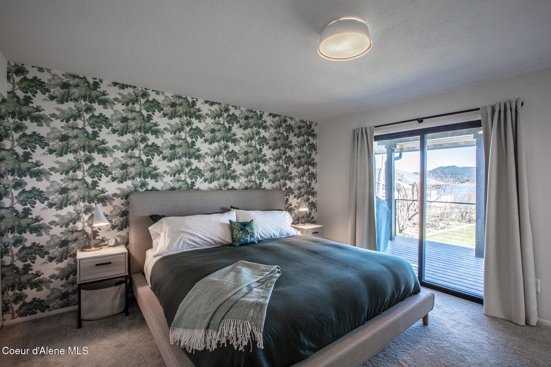 475 Campbell Point Road Laclede, ID 83841 - Photo 23 of 66 Inviting slider to covered deck