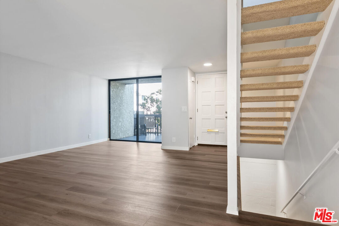29239 Heathercliff Road, Unit 12 Malibu, CA 90265 - Photo 8 of 32 a view of empty room with wooden floor