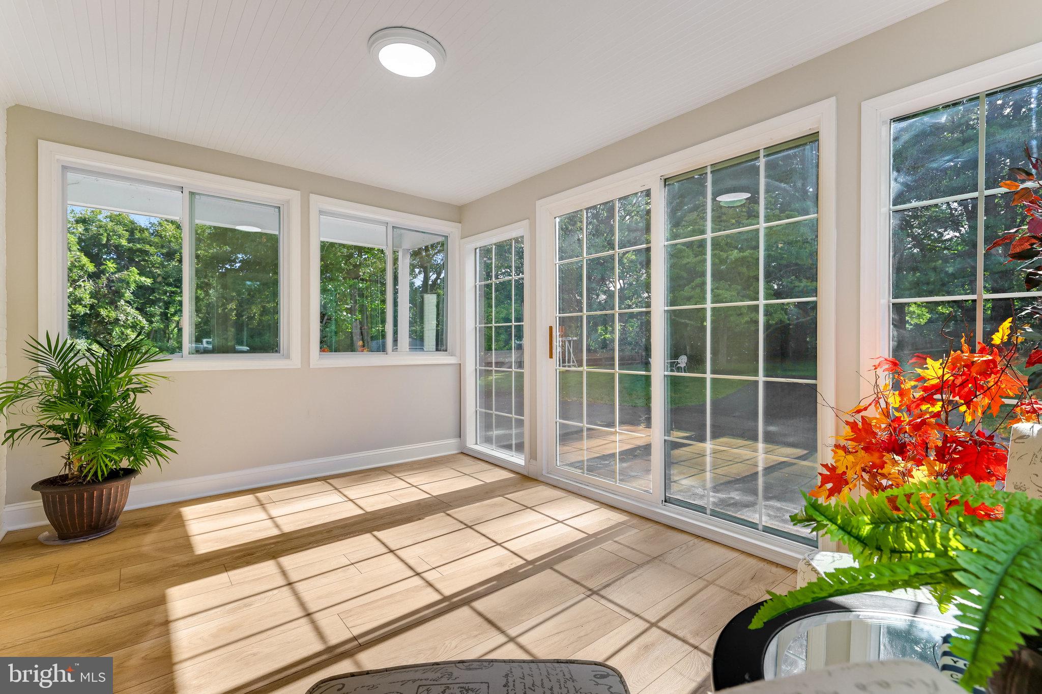 11410 Waples Mill Road Oakton, VA 22124 - Photo 23 of 62 Sunlit serenity in a garden room.