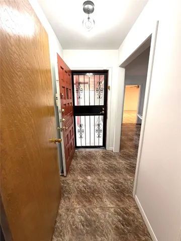 a view of a car park next to a yard